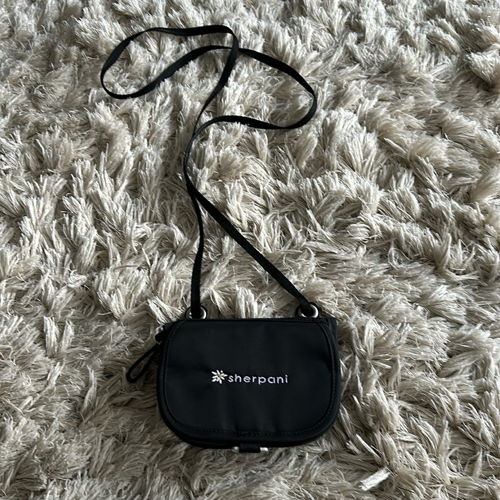 Mini Sherpani purse with magnetic closure and zipper closure